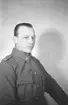 Porträttfoto av soldat Gustav Björn Andersson (nummer 1104), bilförare vid F 19, Svenska frivilligkåren i Finland under finska vinterkriget, 1940.