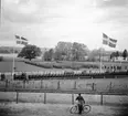 Inmarsch på Rocksöjvallen. Svenska Flaggans Dag.