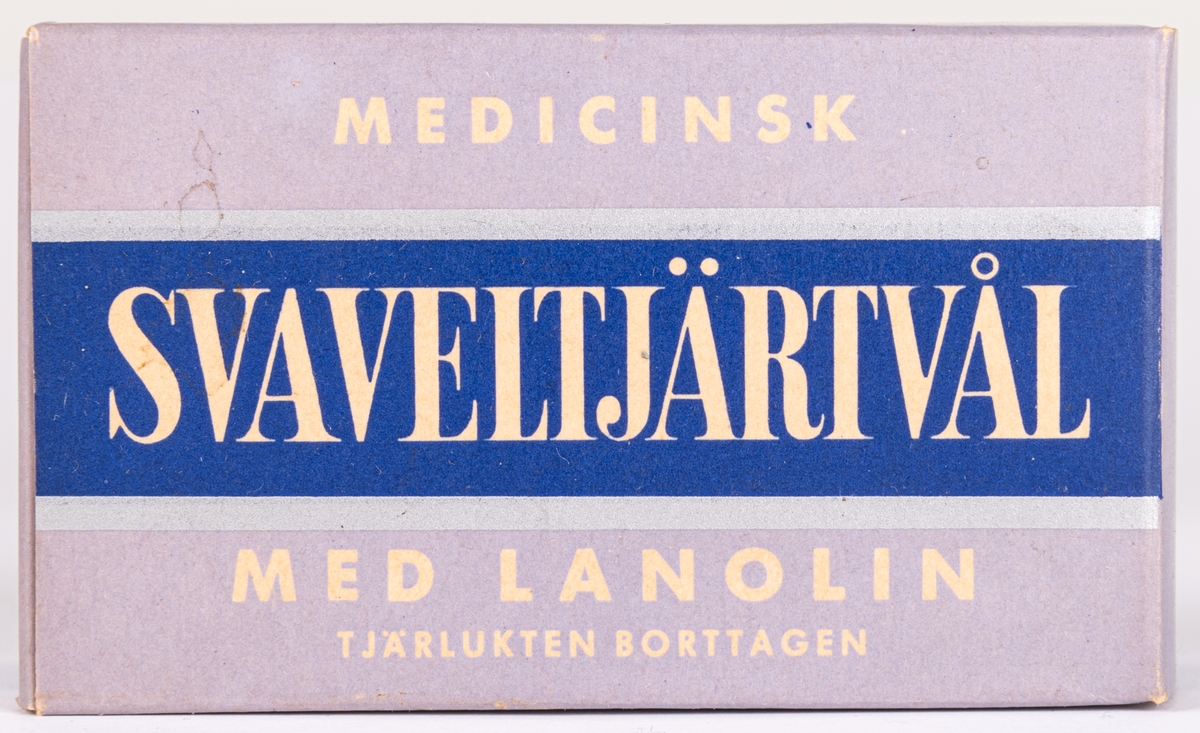 Förpackning för tvål. För medicinsk svaveltjärtvål. Ask i blått och lila.