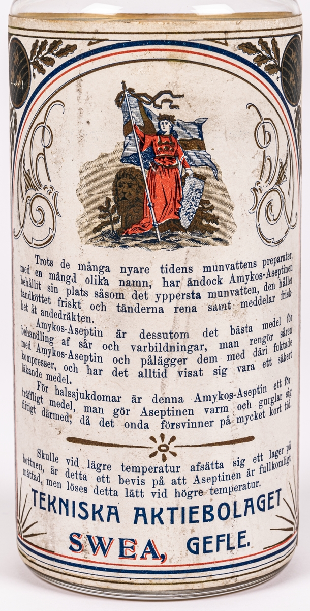 Glasflaska. 
Etikett med text; 
Tekniska aktiebolaget
Sweas Äkta
Amyktos-Aseptin. 
För toiletten.