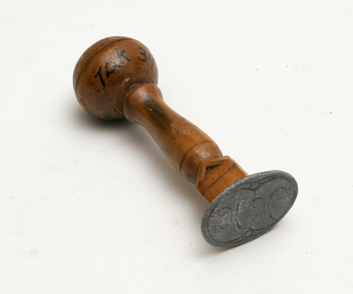 Signet med monogram "K.K."