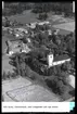 Flygfoto av kyrkan med Lindgården, Tärna, Kumla