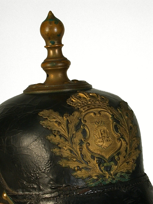 Anmärkning: " Pickelhuva ".