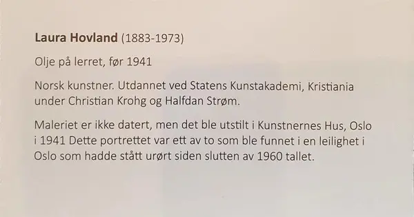 Plakett til maleri. Kort informasjon om kunstner Laura Hovland