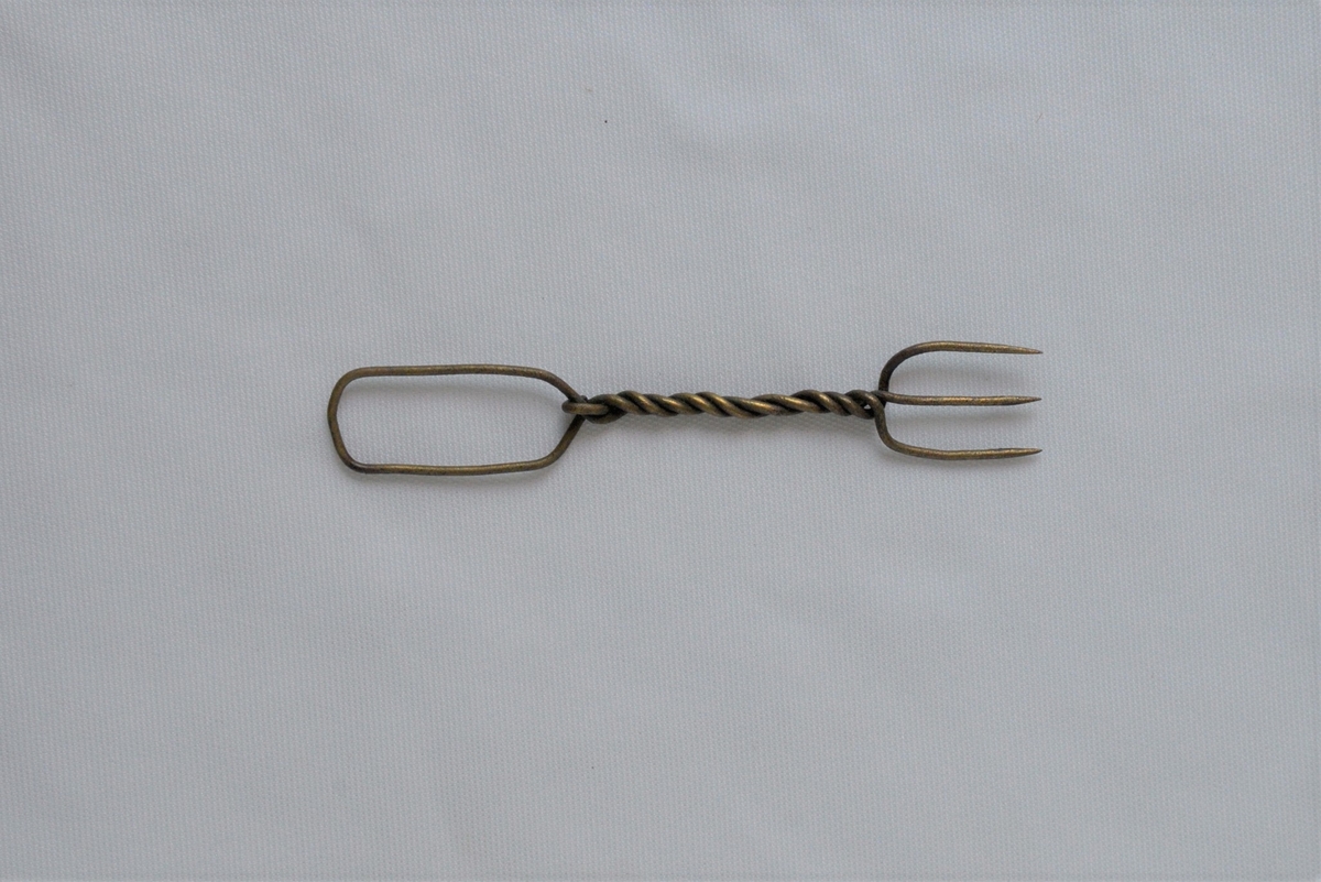 Liten gaffel i metall