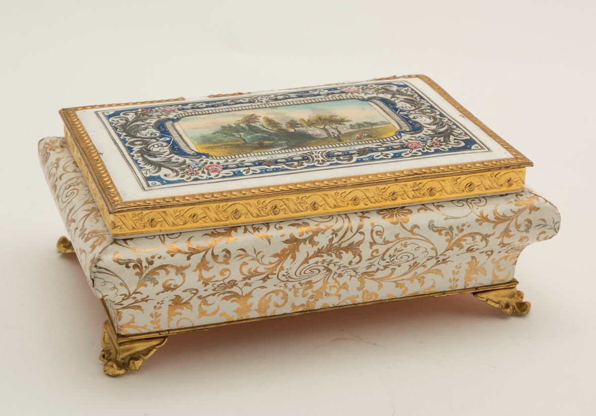 Skrin med speil i lokket. Trykket motiv på utsiden.