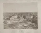 Vy från kyrktornet i Heliga trefaldighets kyrka. 1870-tal. Gävle fängelse och Gävle slott.