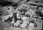 Flygfoto över Hässleby kyrka i Mariannelund, Eksjö kommun, Jönköpings län 991/1967