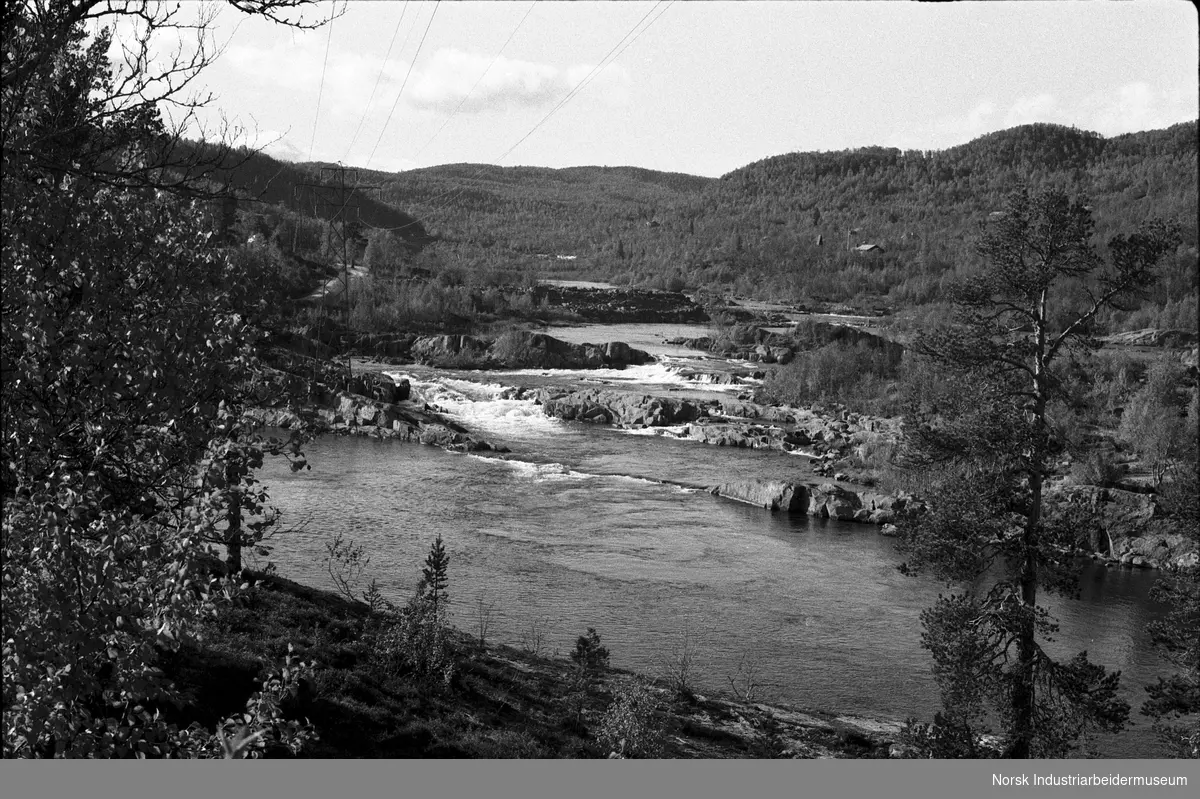 Fra Frøustul feriested, med hytter, bruer og annen arkitektur.