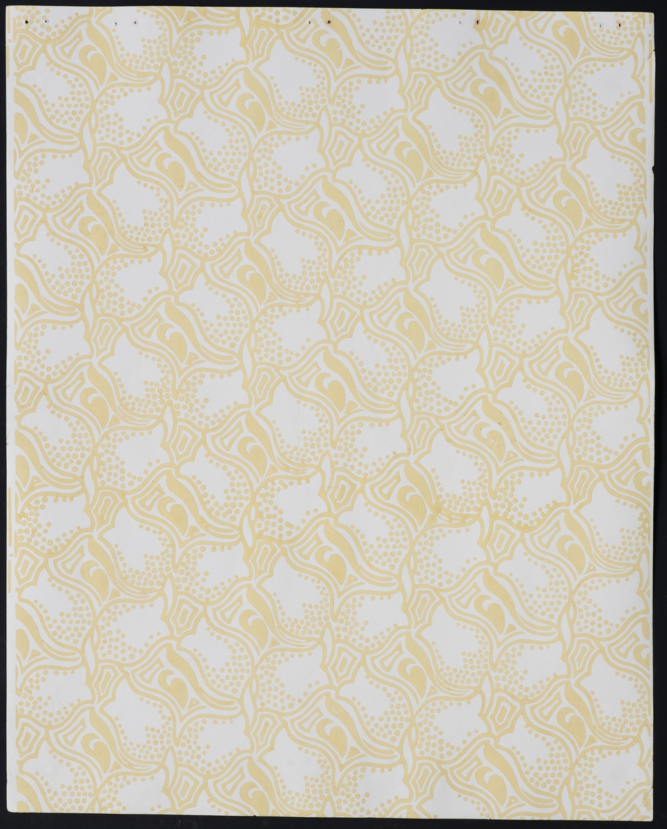 Bok/ hefte med 26 tapetprøver à 47,8 x 59,8 cm. Boken består av 5 mønster med ulike fargevariasjoner. Mønstrene er Tulipan, Akeleie, Dahlia, Dynamografikk og ett uten navn.