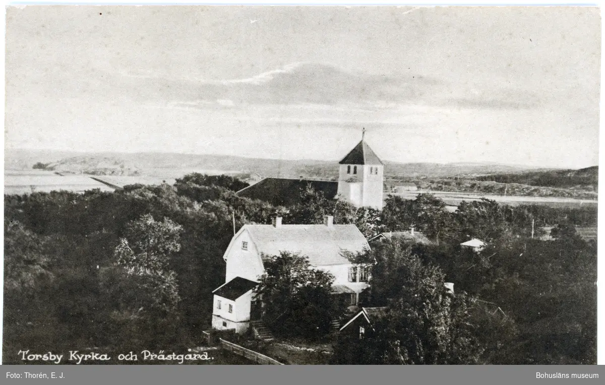 Tryckt på kortet: "Torsby Kyrka och Prästgård."