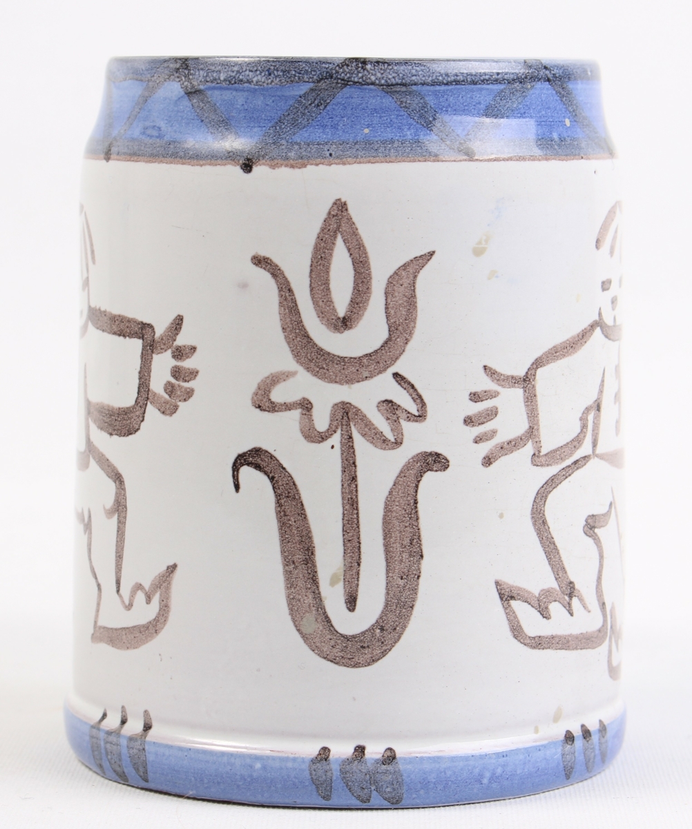 Motiv av 2 personer og en blomst.