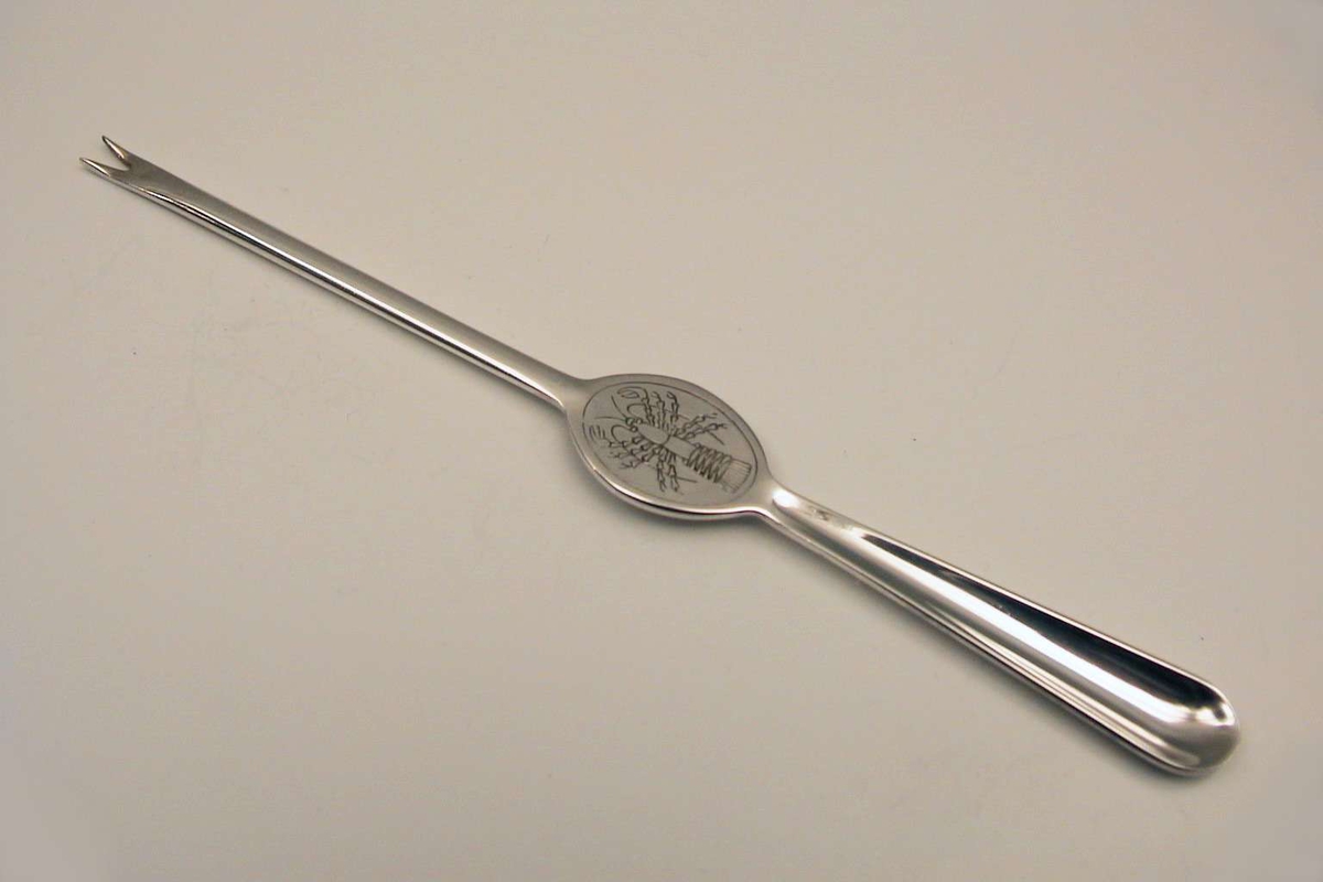 Hummergaffel i sølvplett. 