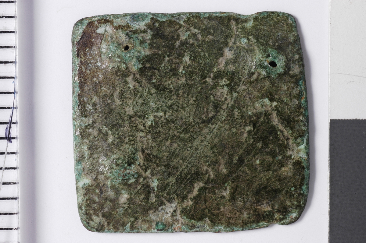 Fire punslede punkt, et i hvert hjørne.