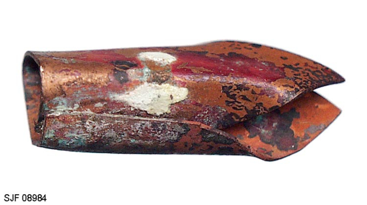 Gjenstanden, kobberhodet, antas å være emne, halvfabrikat, for hodet til en phantomsluk. Styrevingene (propellvingene), som ikke er med til dette objektet, og som gjør at sluken roterer, loddes fast til hodet. 
Beskrivelse fra tidligere protokoll: "Halvfabrikata (hode) til en devonsluk."