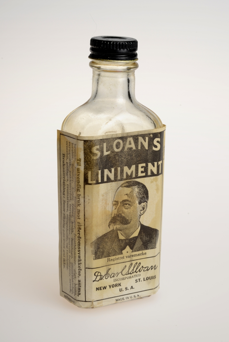 Gjenstandens emballasje og flaske har begge sentralt et portrett av Dr. Earl S. Sloan; en mann med kjemmet hår og markant bart, dressjakke, skjorte og tversoversløyfe. Over portrettet er navnet på produktet, under portrettet er mer informasjon om produktet og produsent.