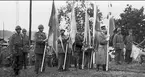 Invigning av Karolinermonumentet i Märsta med fanor och standar under invigningen, högtidligheten och fältgudstjänsten.