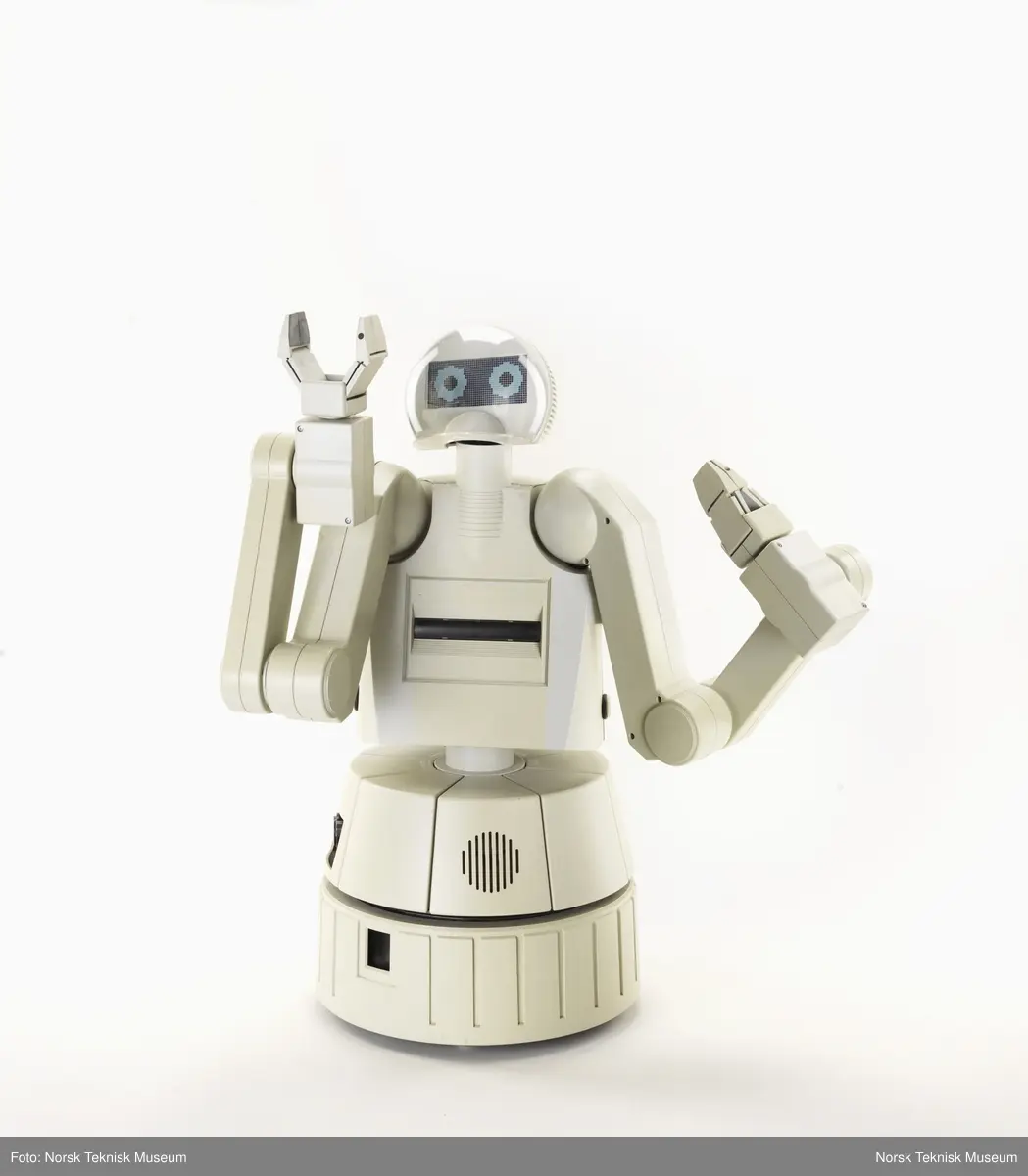 Tredelt datamaskin med robotarmer.