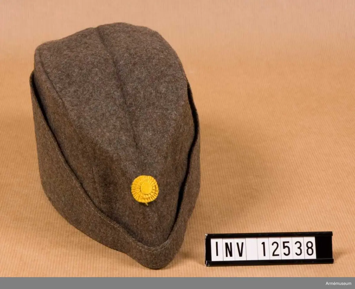 Grupp C I.

Svettrem av läder, märkt 58 (storlek), K.4, 1937, 568.