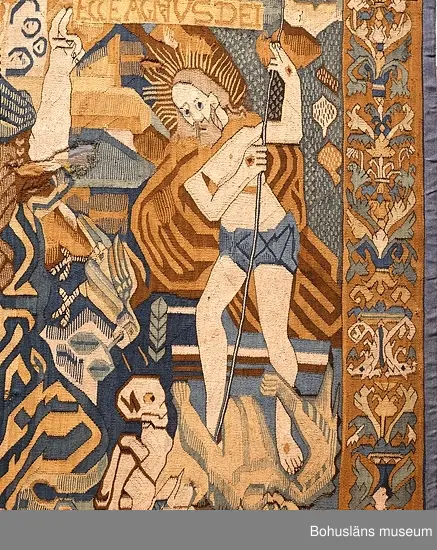 Bildvävnad från tidigt 1600-tal i lin, ull och hår. Flamskvävnad. Scener ur gamla och nya testamentet. I mitten Livets träd på vars vänstra sida återges scener ur gamla testamentet. På trädets högra sida den knäböjande jungfru Maria, Kristus på korset med omgivande bård, troligen efter försättsblad till tysk bibel 1500-talets förra hälft. Troligen nordtyskt arbete.


Ur handskrivna katalogen 1957-1958:
Gustavsbergstapeten
ÄVEN KALLAD GULLMARSBERGSTAPETEN.
DEPOSITION I APRIL 1947 AV GUSTAVSBERGS BARNHEM ENLIGT LAPPKATALOG. 242 x 205 cm.