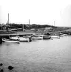 Skåne, Kristiansstads län, V Barkåkra socken, Vejbystrand. Hamnen. Hamnplanen med kajen i strandlinjen sett från SV.