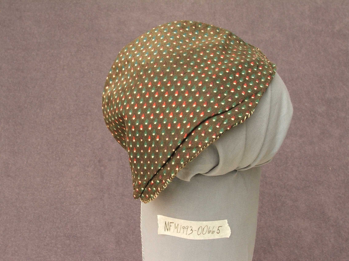 Dråpeformer med kvit prikk nedst i dråpe.