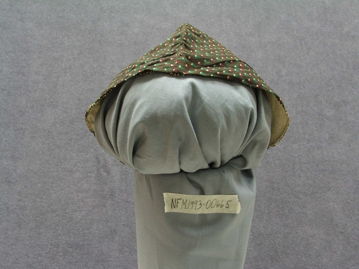 Dråpeformer med kvit prikk nedst i dråpe.