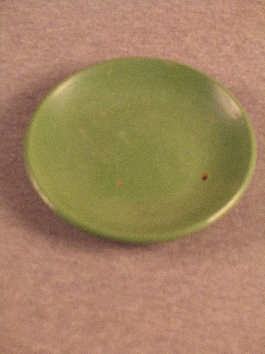 Lodrette riller rundt heile potta