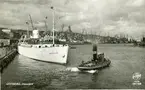 Vykort föreställande Göteborgs hamn. Kronprinsessan Ingrid under utbogsering.
Vykortet är från 1950-talet.