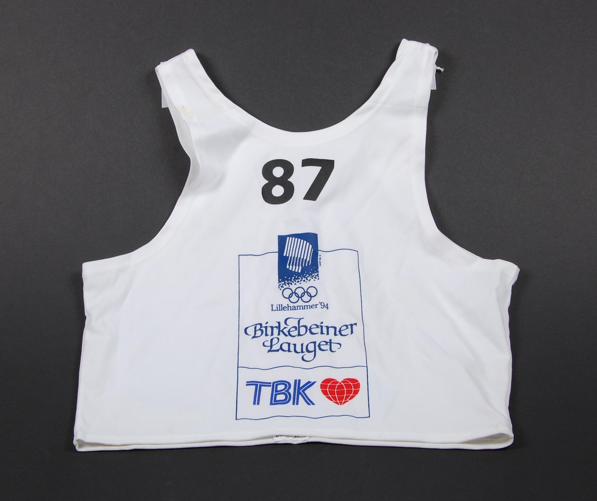 Startnummer med nr. 87 og logoer for Birkebeinerlauget og TBK.