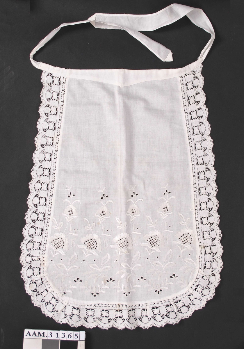 Broderte blader og blomster.