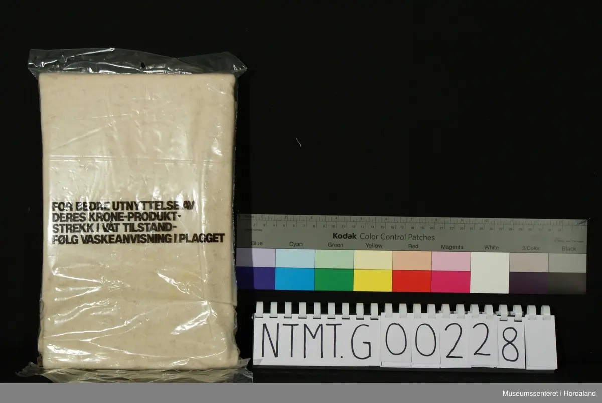 Lange ermer med brotavslutning, rund hals