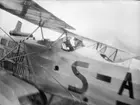 Närbild av flygförarplats av flygplan Bréguet XIV B2 civilregistrerat S-AIAA med förare vid ILUG i Göteborg 1923.