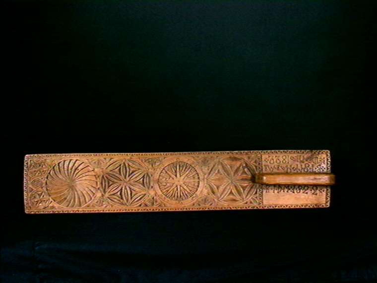 Mangletre og rullestokk