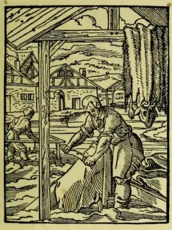 Historisk tresnitt av en garver som bearbeider dyrehud, fra Jost Ammans bok om håndverkere.