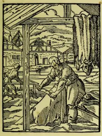 Historisk tresnitt av en garver som bearbeider dyrehud, fra Jost Ammans bok om håndverkere.