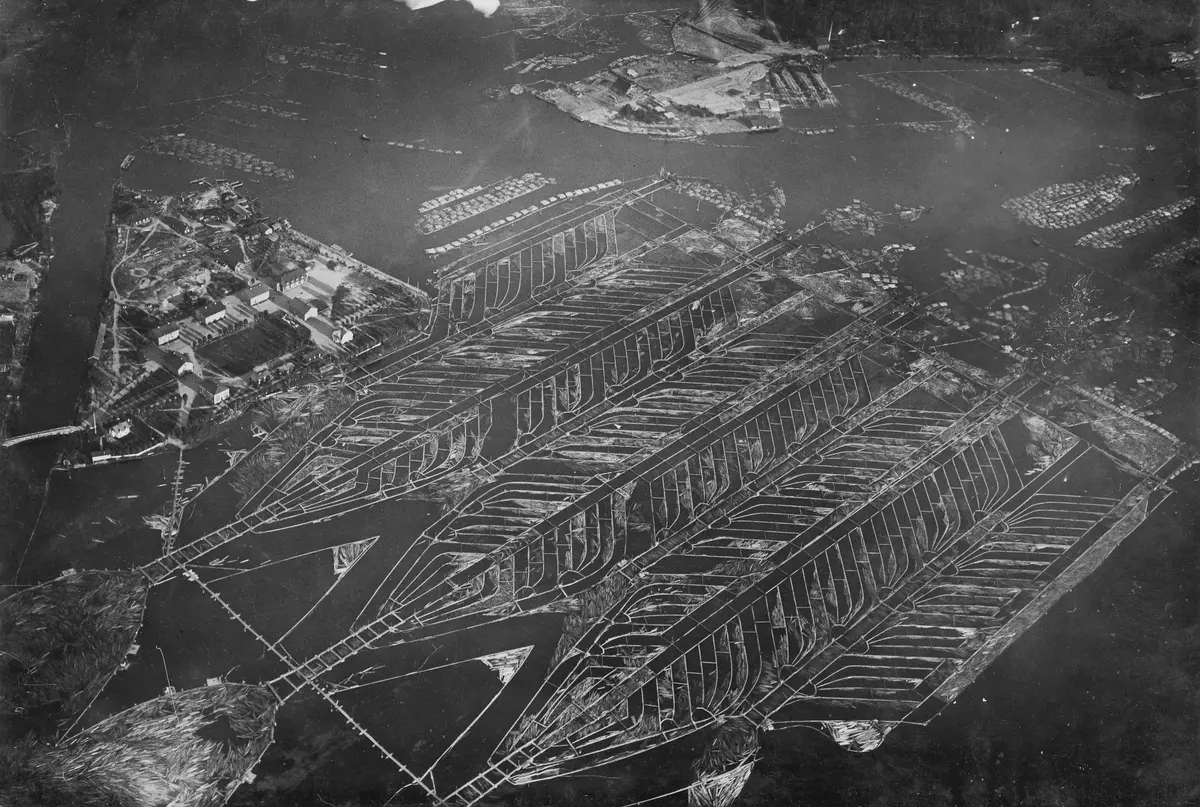 Fo-U11164 Flygbild över timmersorteringen i Sandslån, fotograf Oscar Bladh, 1924