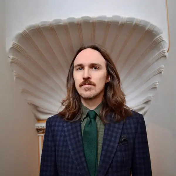 Porträtt av Per Faxneld, man i kavaj och slips