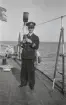 Edward Hamilton med skeppskatt på kustjagaren REMUS.

REMUS var en tidigare italiensk jagare som Sverige köpte 1940 för att stärka sin flotta. På väg hem till Sverige stoppades hon, tillsammans med tre andra jagare, av brittiska flottan vid Skálafjørður på Färöarna. Efter diplomatiska förhandlingar frigavs fartygen och REMUS togs i svensk tjänst.