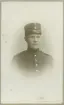 Porträtt av en man i uniform.