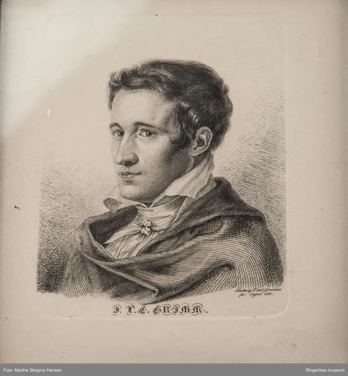 Portrett av Ludvig Emil Grimm som ung mann i 3/4-profil, ansiktet halvt vendt mot hans høyre side. Blikket vendt mot betrakteren.