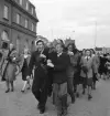 Tredje dagens studenter, 1944.
En student bärs iväg längs Storgatan av sina kamrater. 
Till vänster syns dåv. Skånska Bankens hus.

Angående avgångsklassen 1944 - se 