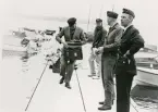 Vid Helgasjön, Evedal, 1962.
Åke Rudolfsson (tandtekniker), Sven-Åke Andersson (kommunalråd), Roland Blohm och Lennart Karlsson på bryggan.