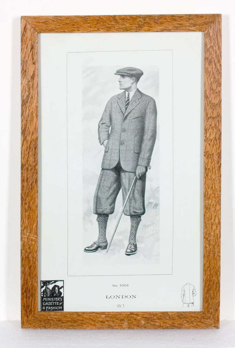 Svart/vitt tryck. Text: No 5906 LONDON WI samt märke i hörnet med text: MINISTER´S GAZETTE of FASHION. Ljusbrun träram. Glasad. På baksidan skrivet med bläck år 1915.