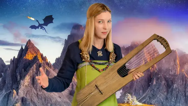 Kvinne i grønn vikingkjole med harpe. Drage i bakgrunnen