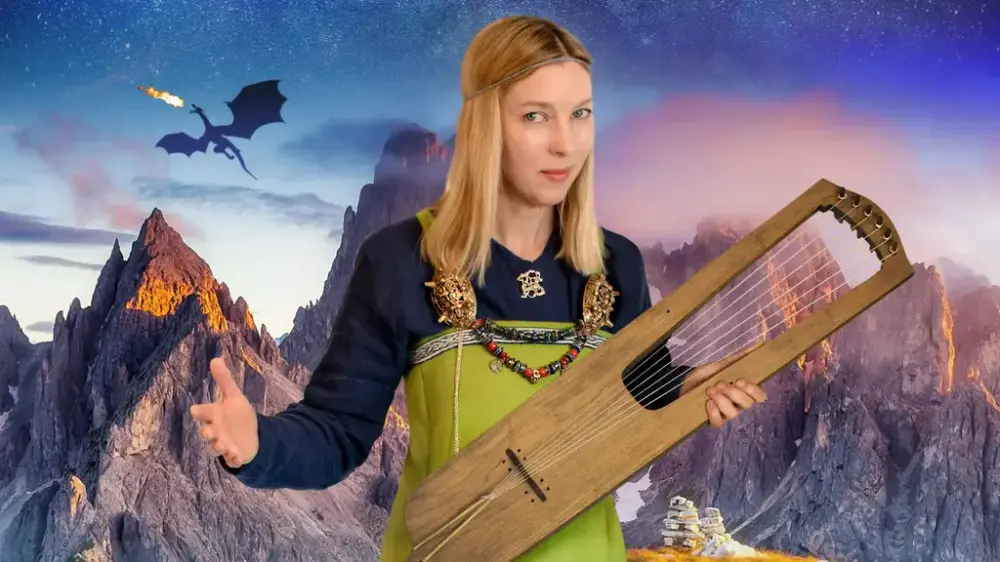Kvinne i grønn vikingkjole med harpe. Drage i bakgrunnen