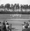 Gymnastiken 1944.
Gymnastikuppvisning (truppgymnastik) av manliga gymnaster.
Fotot taget från publikläktaren.