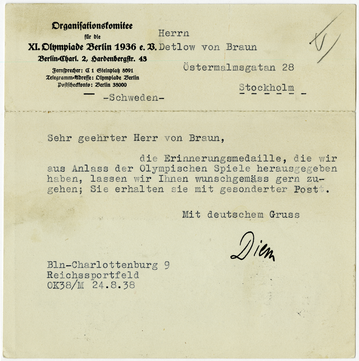 Sida ur Detlow von Brauns fotoalbum. Brev från Organisationskommittén i Berlin.