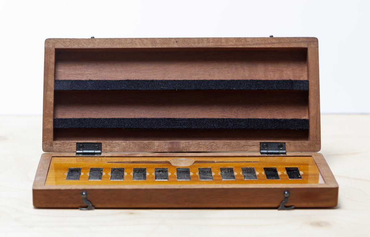 C. E. Johansson wanted to develop a set of combination gauge blocks that could be combined with each other to be able to provide all the measurements needed in industrial manufacturing. His combination gauge first had 102, then 46 pieces of steel that became world famous. The steel pieces' surfaces were so even that they were held together and could not be pulled apart. Instead, they would be pushed apart laterally. The pieces of steel could form a rod of precise length that could be picked up and held without falling apart. It was used to calibrate other measuring tools and machines. He went down in history as Mått-Johansson and worked for a time for Henry Ford in the USA.