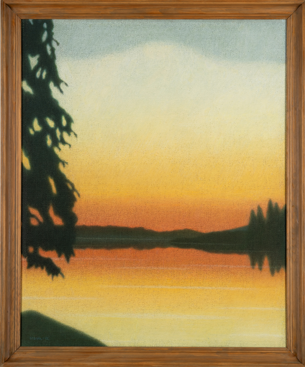 Sjö i solnedgång.